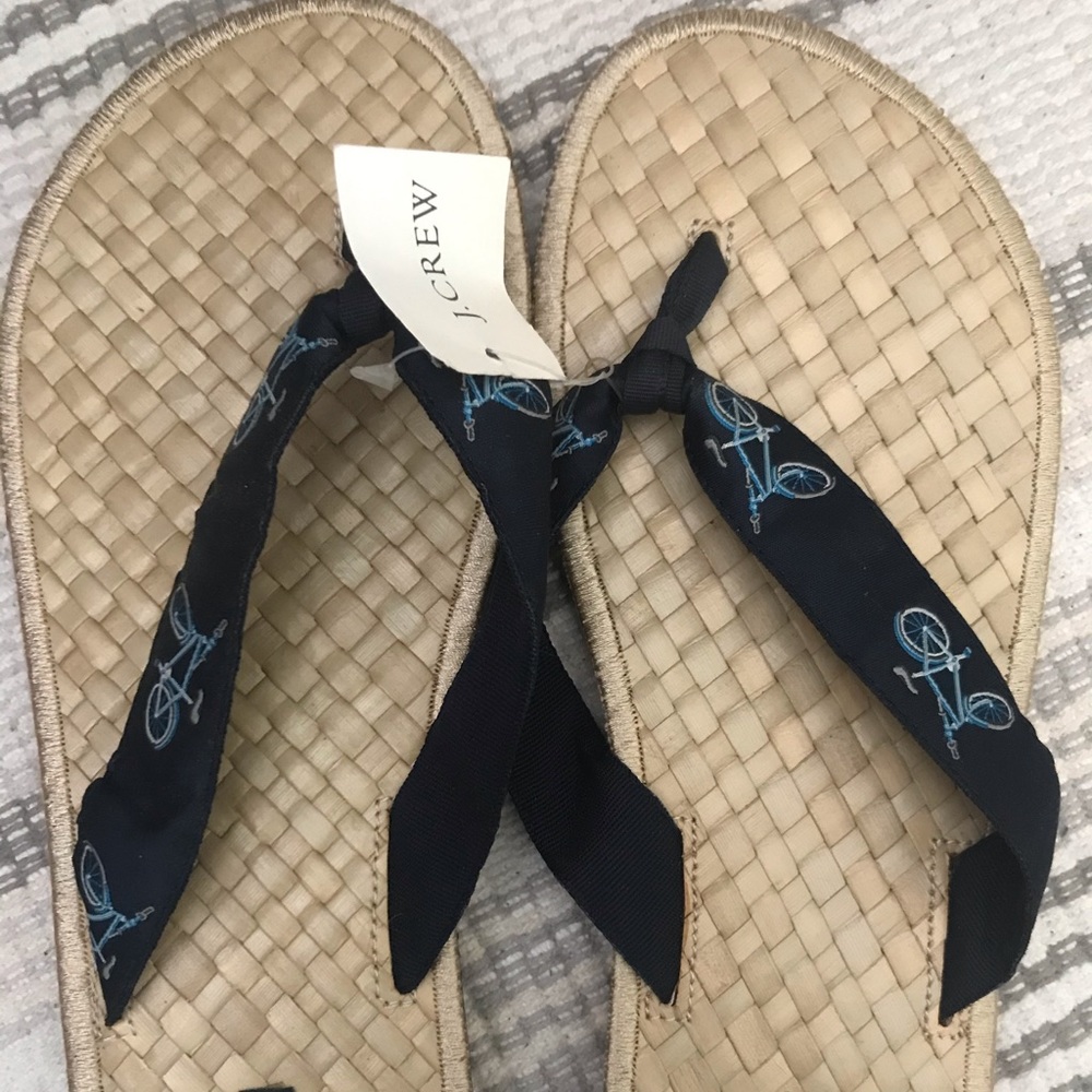 J Crew woman’s flip flops.